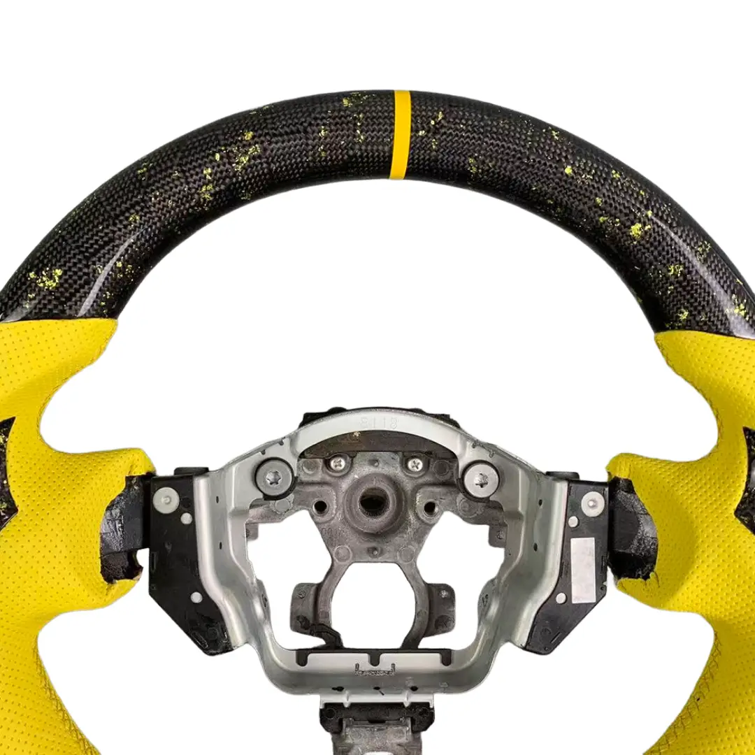 Nissan 370Z Carbon Fiber Steering Wheel w Yellow Flakes – Up Close Angle Nissan 370Z Carbon Fiber Steering Wheel w Yellow Flakes – Up Close Angle