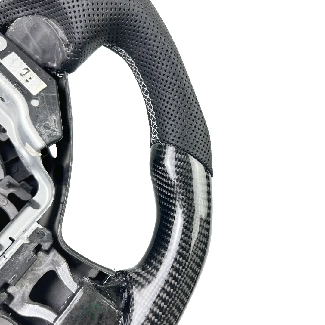 Nissan 370z Carbon Fiber Weave Steering Wheel – 3rd Angle Close Up Bottom Nissan 370z Carbon Fiber Weave Steering Wheel – 3rd Angle Close Up Bottom